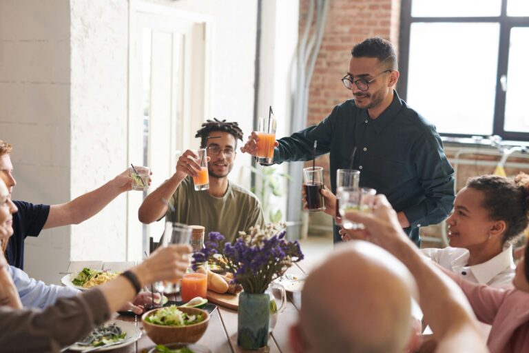 Making a toast at a festive table