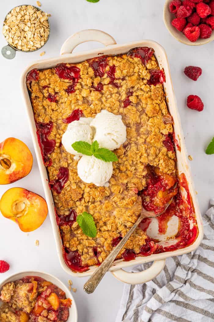 PEACH & RASPBERRY CRUMBLE WITH ALMOND-OAT TOPPING